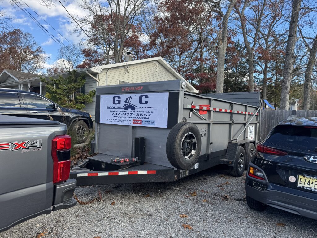G&C Home Improvements trailer on site for new roof installation in Ocean County NJ